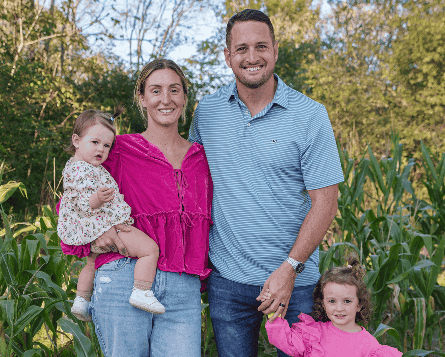 Family enjoying outdoor time in a natural setting.